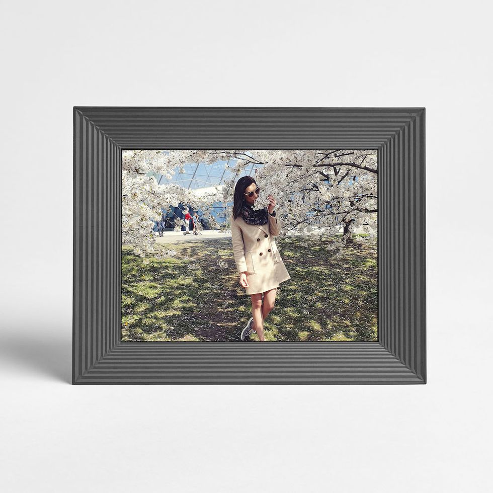 photo of mason by aura digital frame which can push out images from a google photo account.