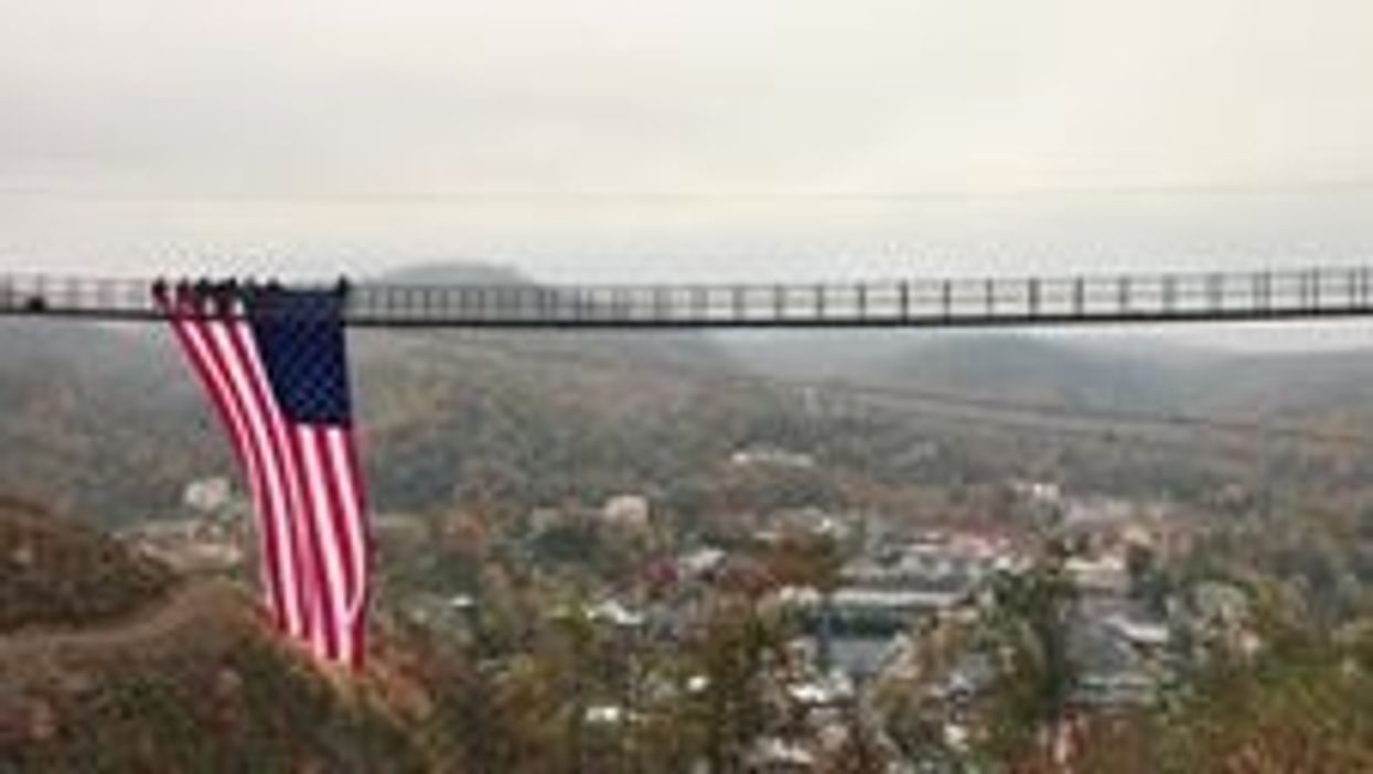 Watch huge American flag unfurl from North America's longest suspension bridge for Veterans Day