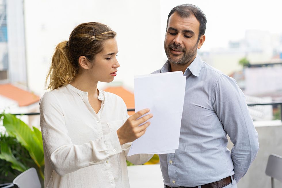 Unemployed woman asking for help on her resume after being laid off from her job