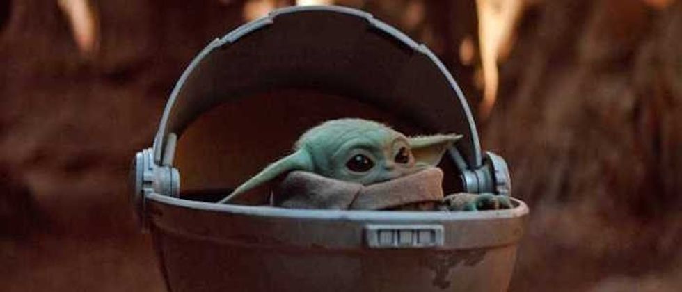 Baby Yoda in his floating crib 