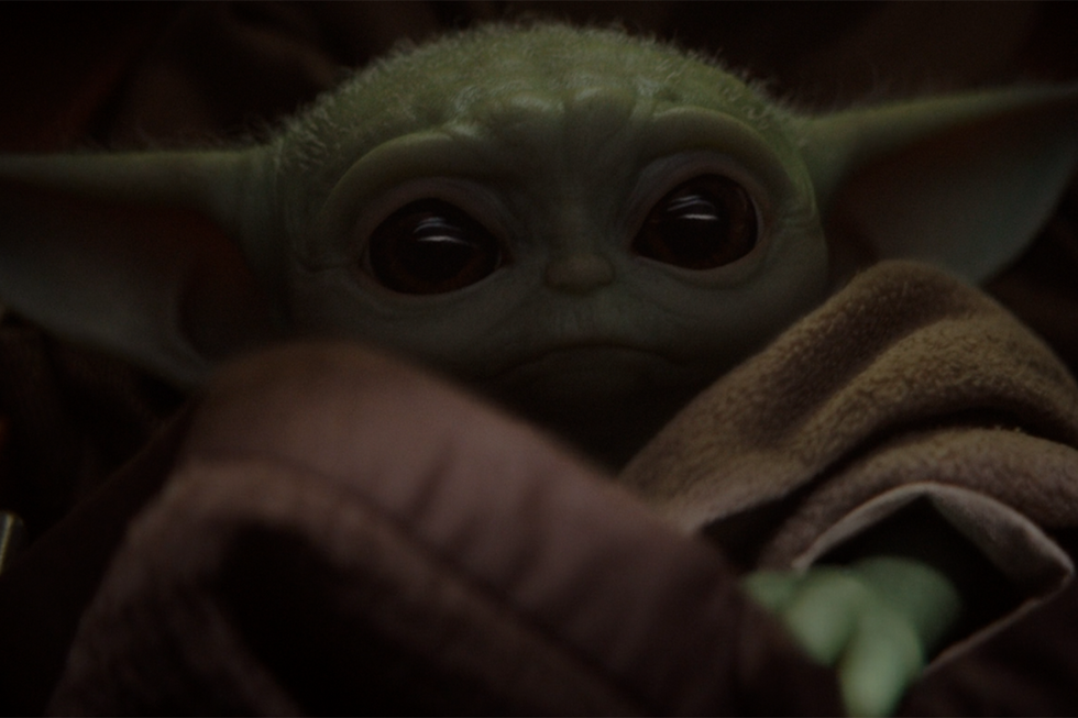 Baby Yoda snuggled up 