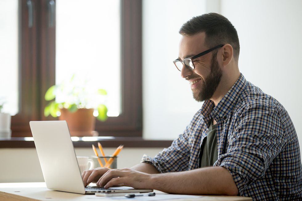 Professional man finishes the year strong by cleaning up his online presence