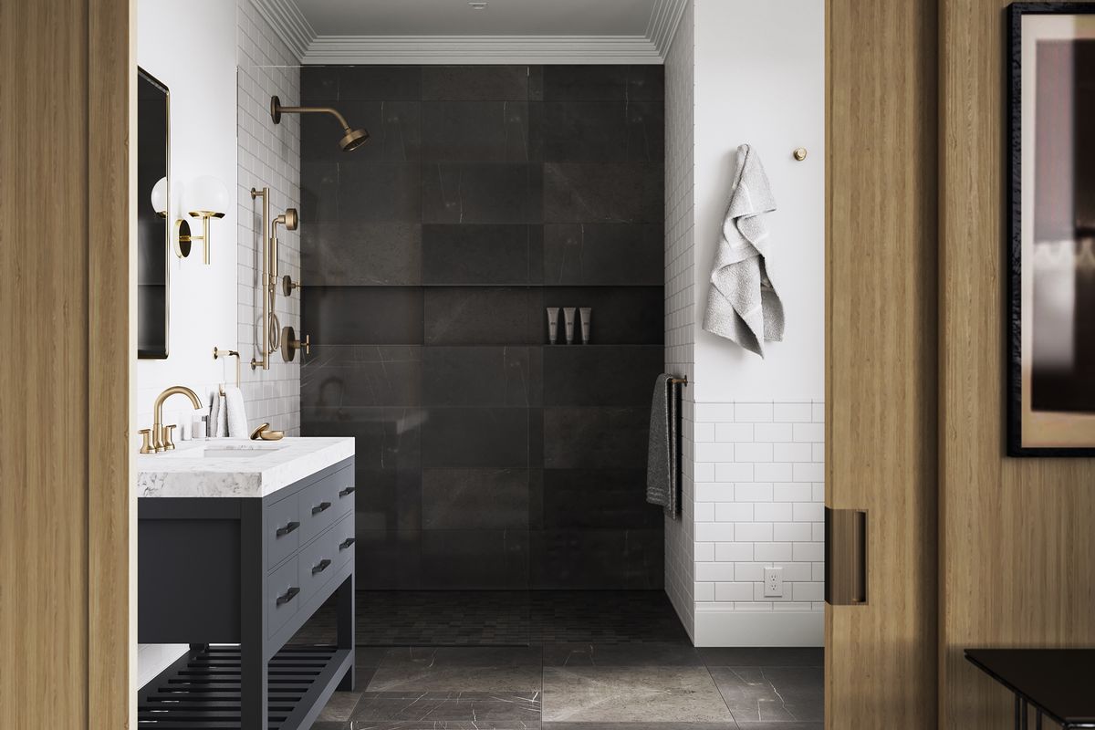 a sleek black and wood nyc bathroom