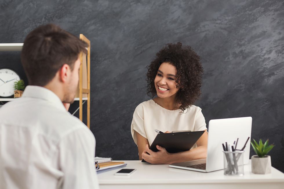 Hiring manager gladly interviewing a job