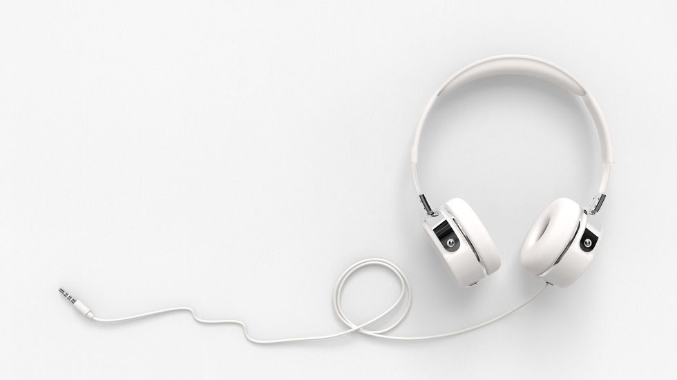 White headphones on white background