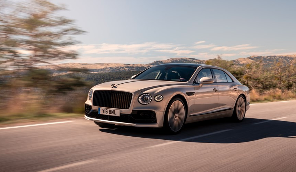 photo of a Bentley on the road.