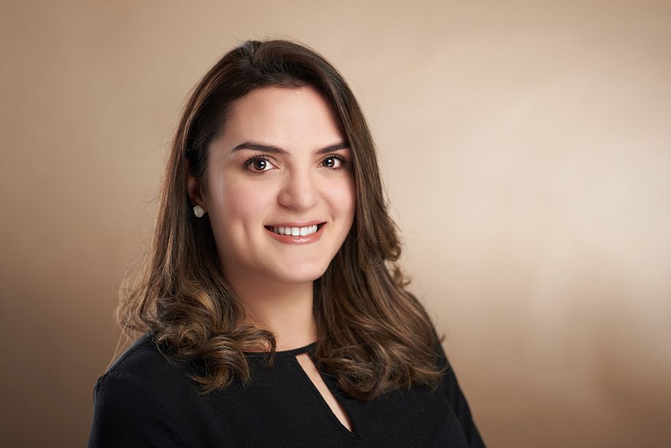 Professional headshot of businesswoman.