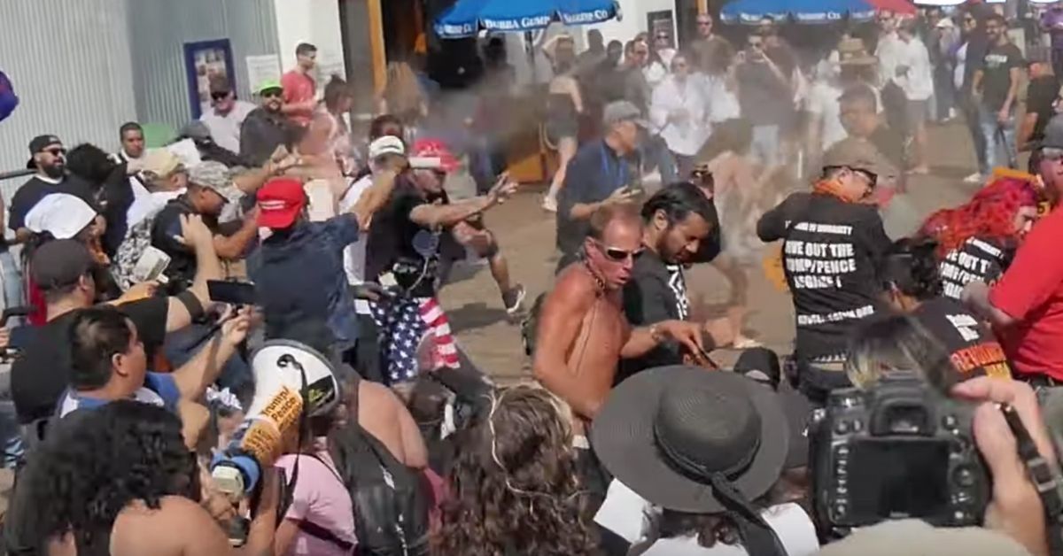 Trump Supporter In MAGA Hat Creates Panic On Pier After Unleashing Bear Spray On Anti-Trump Protesters