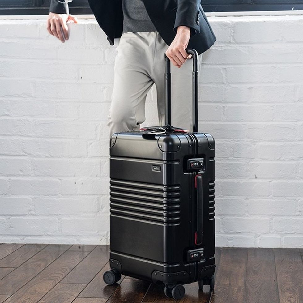 The Arlo Skye portable luggage with wheels and in black