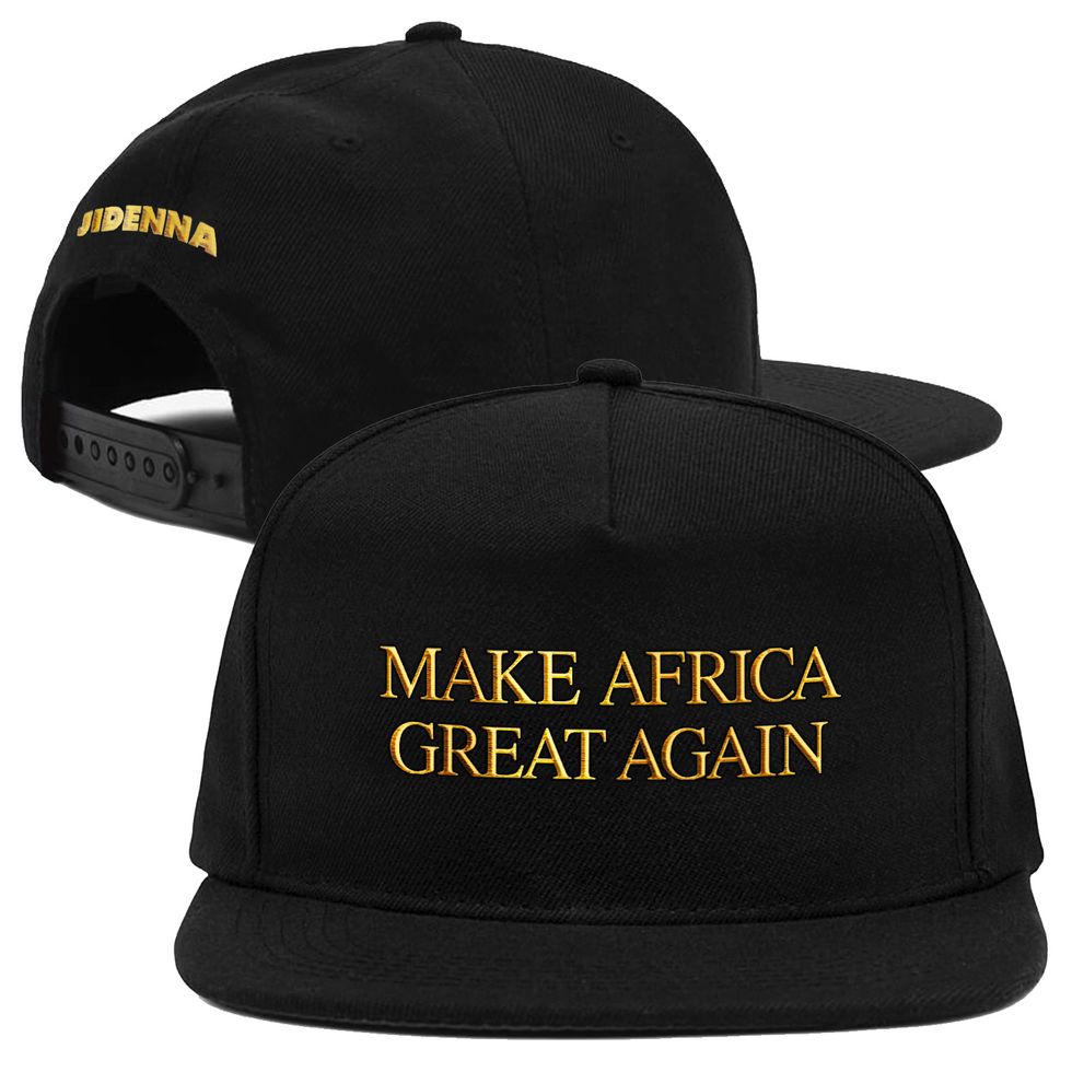 The Make Africa Great Again snapback hat in black with gold writing in the style of one of Trump's MAGA hats.