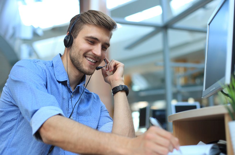 Professional man using tips to be happier at work