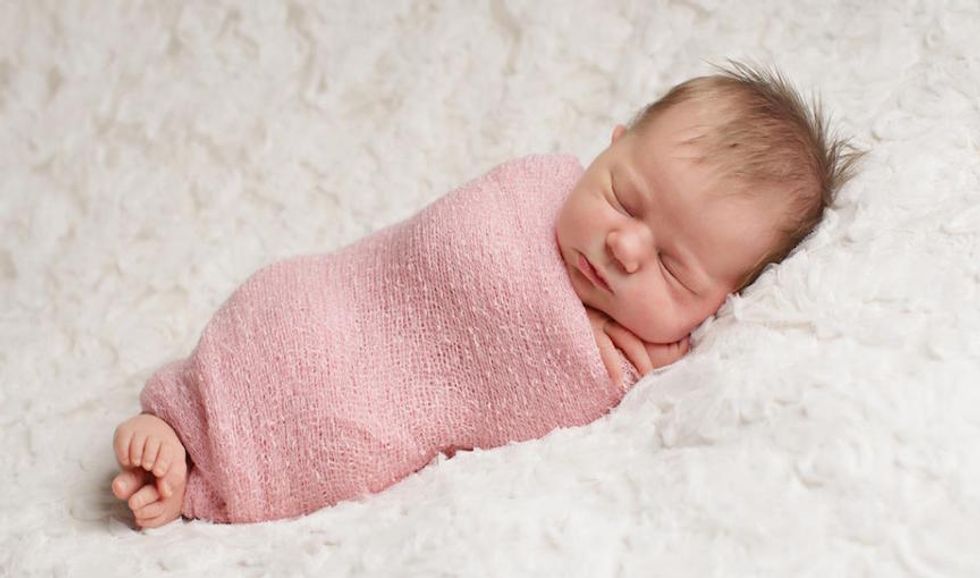 To Swaddle or Not to Swaddle Scientists Dispute What is Safe for