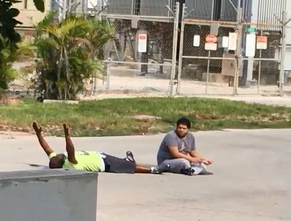 Black Man Shot By Police While Lying On Ground With Hands Up