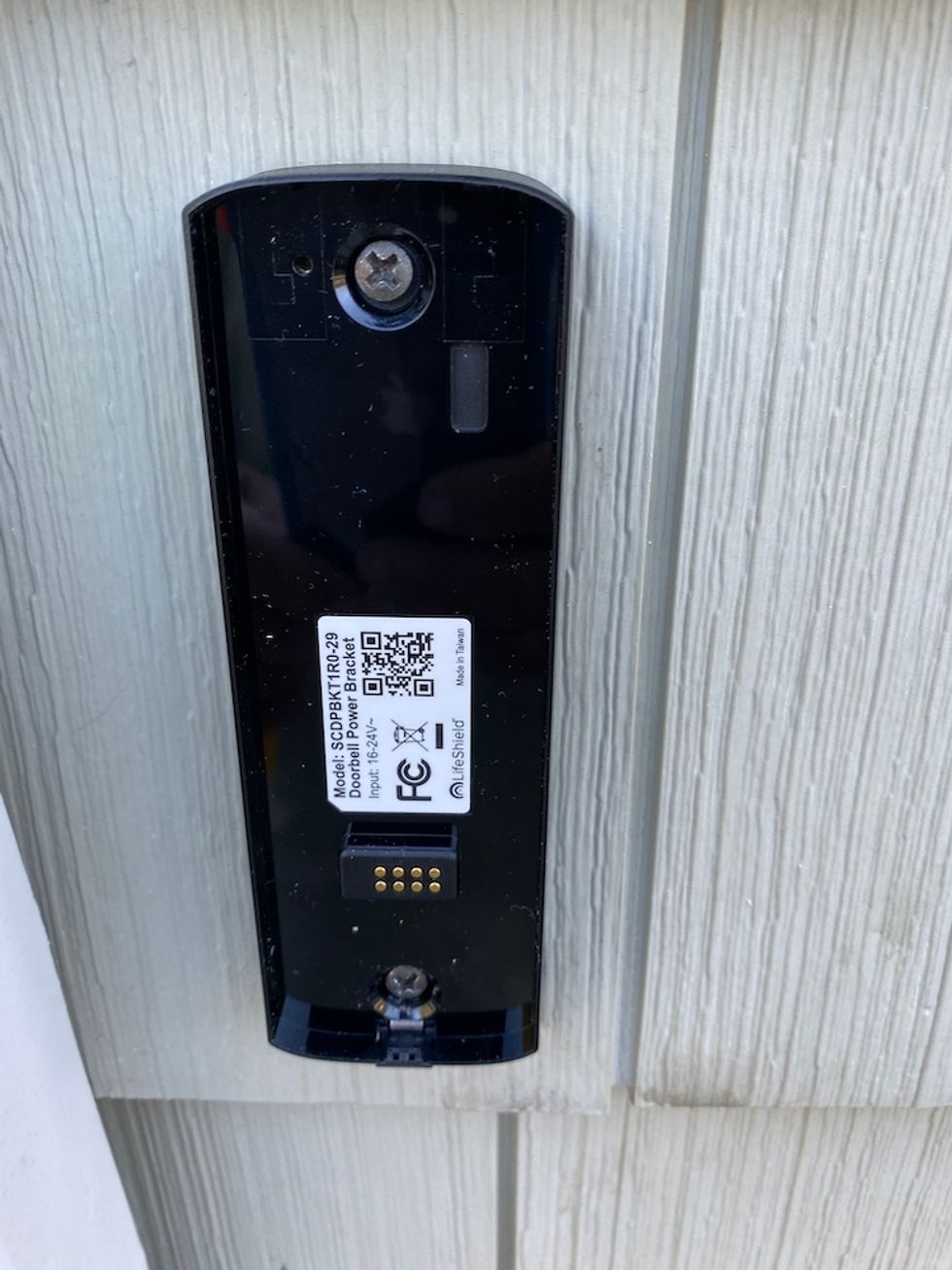 picture of Lifeshield mounted bracket on side of house.