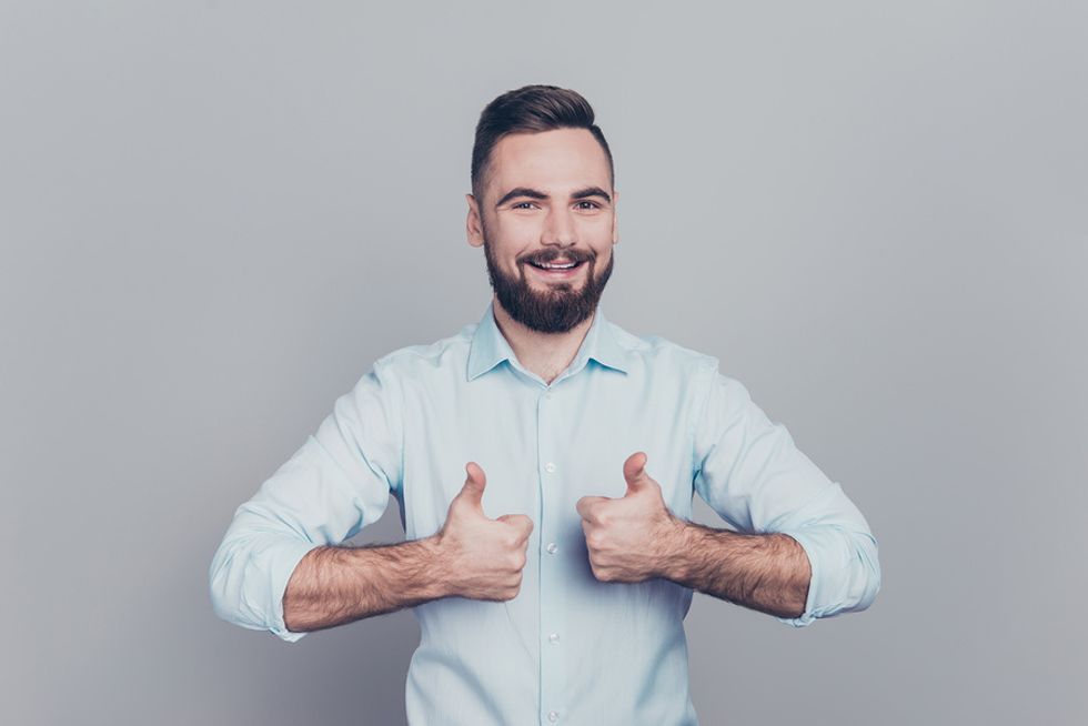 This businessman has a positive and enthusiastic outlook that he incorporates into his personal brand.