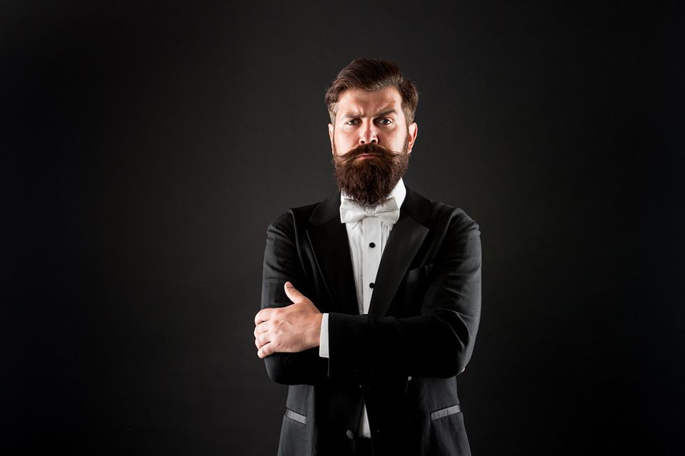 Self-aware businessman ponders his career.