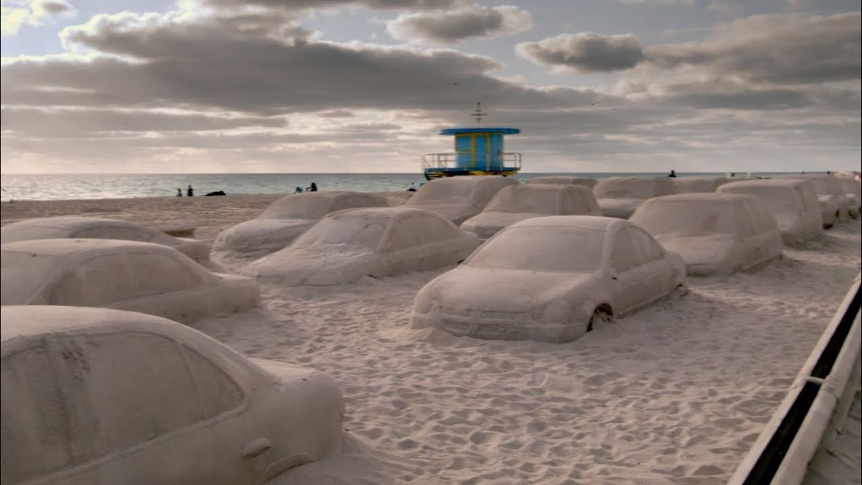 Artist creates 'sand traffic jam' using 330 tons of sand on Miami beach