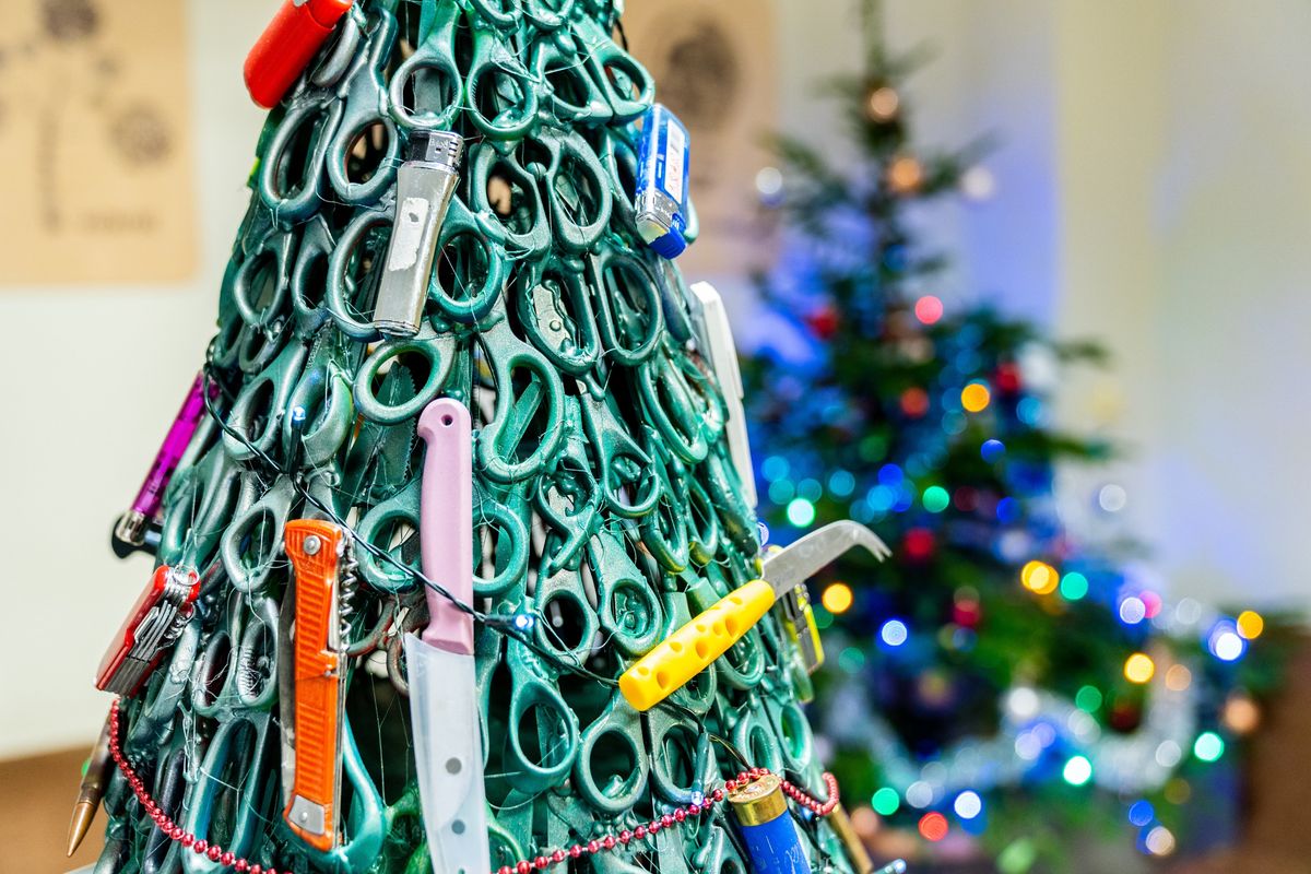 An airport made a Christmas tree out of confiscated items, and it's both festive and educational