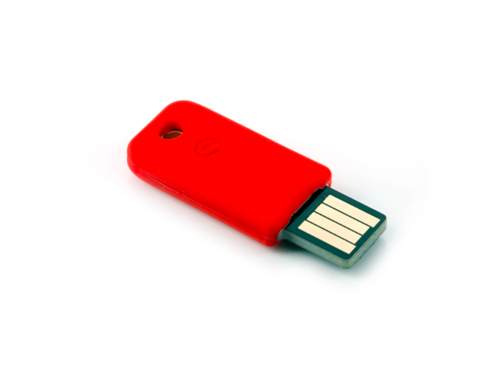 A red security key from SoloKey
