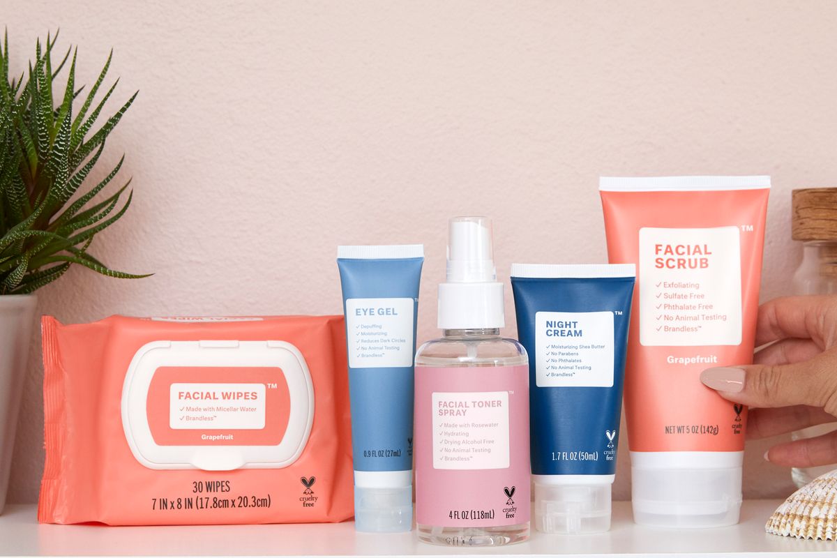 Coral, pink, dark blue, and light blue products from Brandless on a shelf