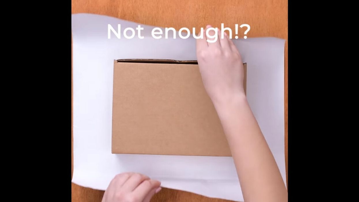 This Christmas Hack For Wrapping Presents When You Don't Have Enough Paper Is A Game-Changer