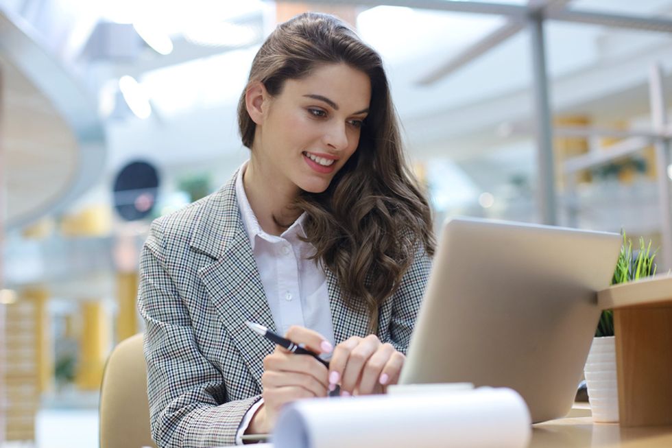 Professional woman creating achievable career goals without fearing failure