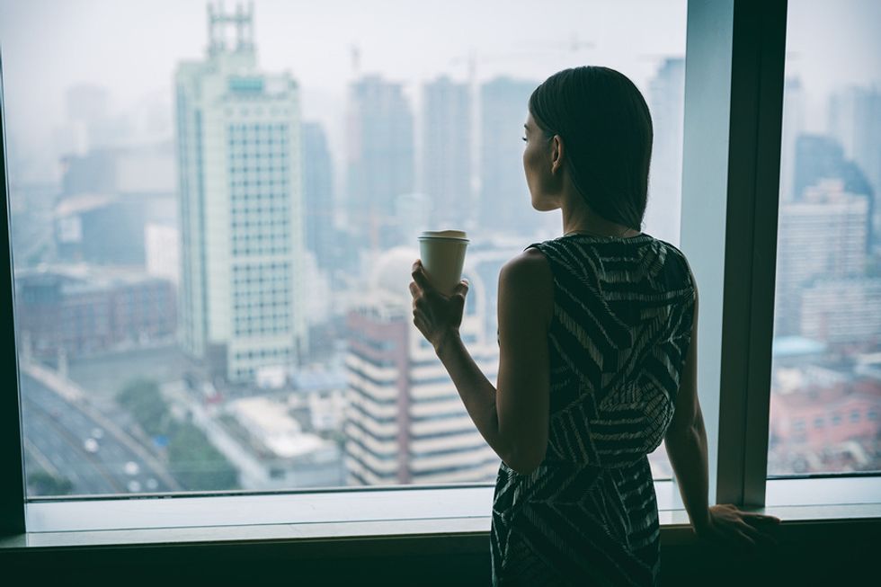 Professional woman thinking about her career goals