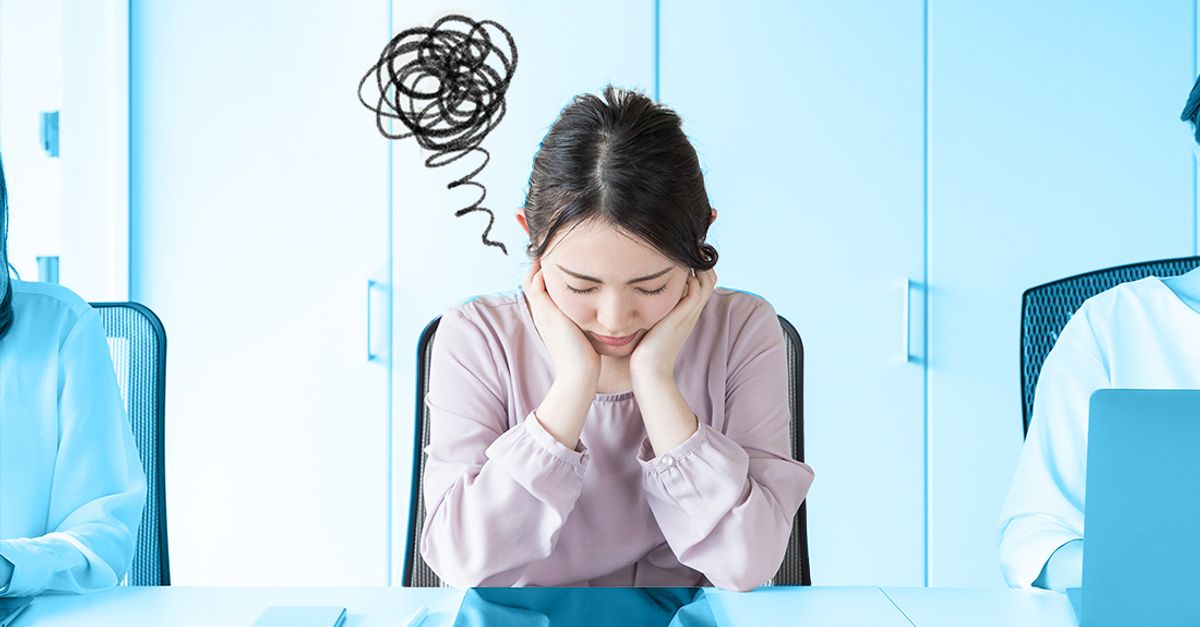 Woman dealing with grief at work