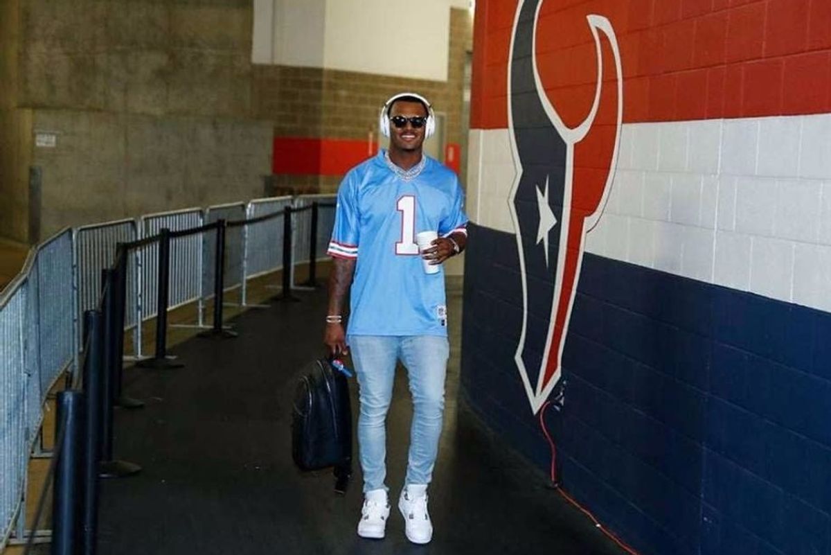Deshaun Watson wearing a Warren Moon jersey