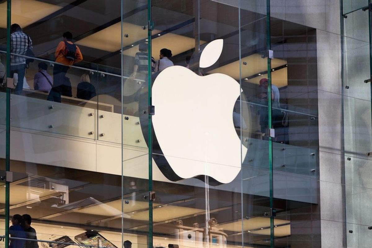 Apple logo on a glass building