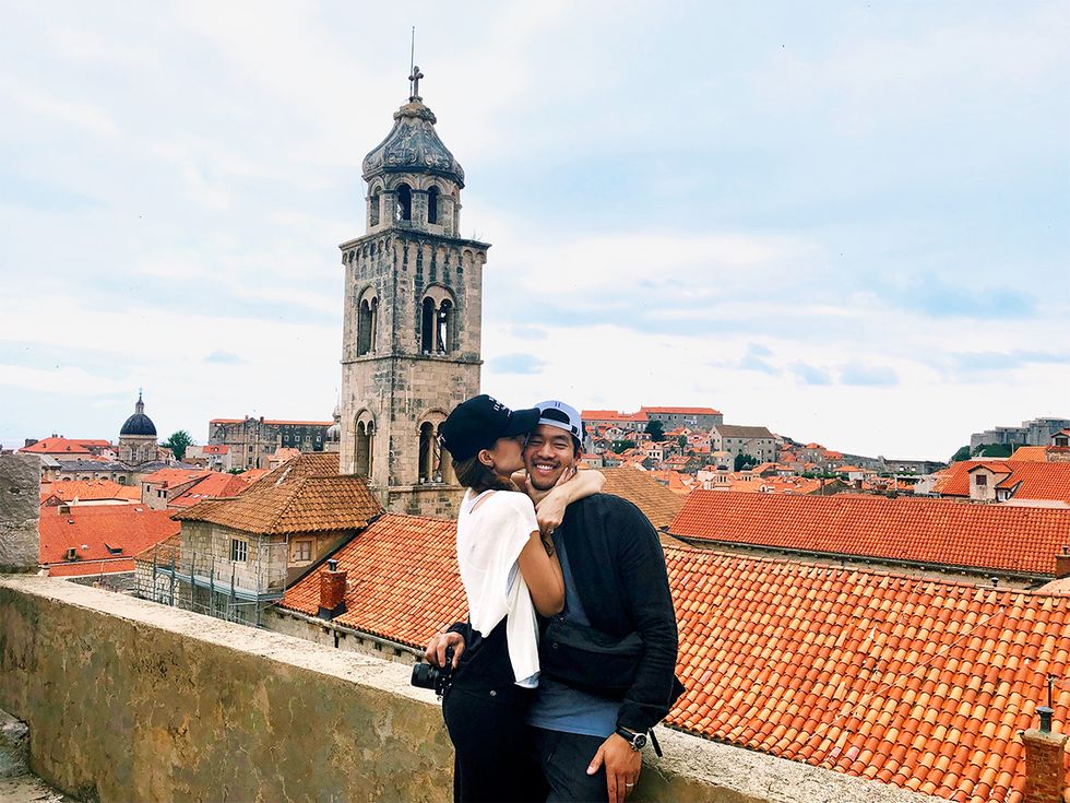 Actor David Lim and wife Marketa Kazdova embracing in old town Dubrovnik on their honeymoon.