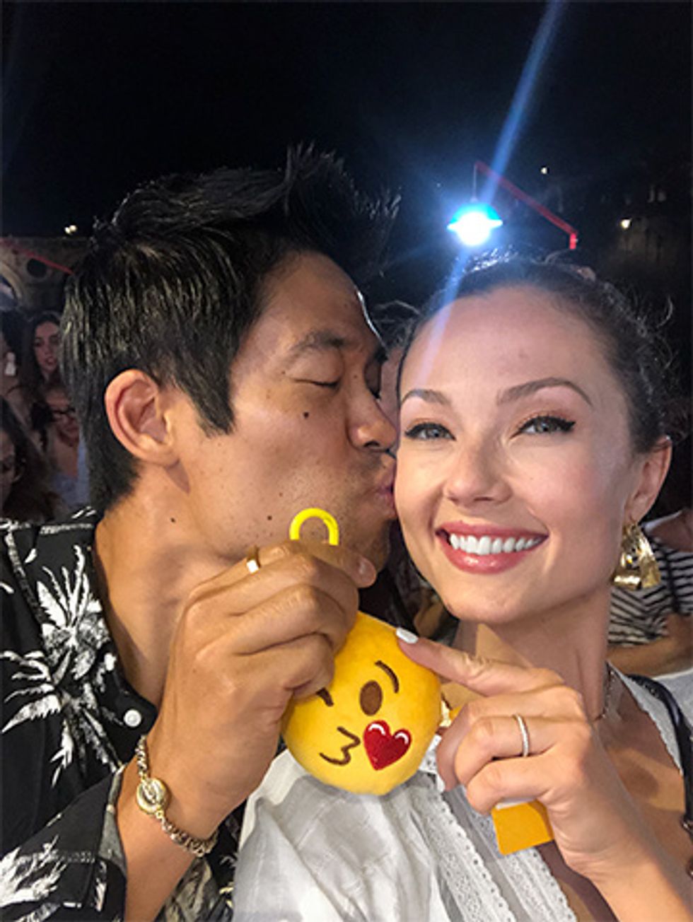 Actor David Lim kissing wife Marketa Kazdova on the cheek while on their honeymoon.