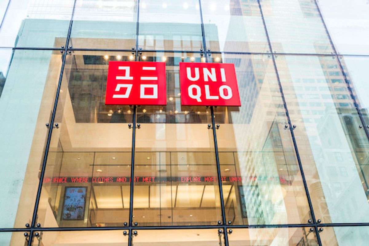 Uniqlo brand logo on a glass window in New York