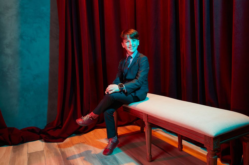 Actor Iain Armitage of TV show Young Sheldon in a photo studio.