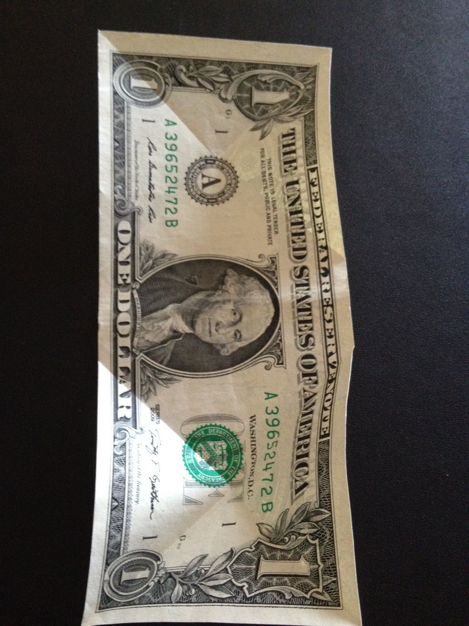 folding dollar bills