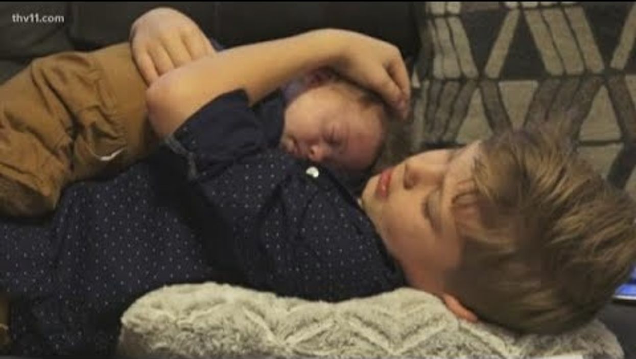 Arkansas boy melts hearts by singing to his baby brother with Down syndrome