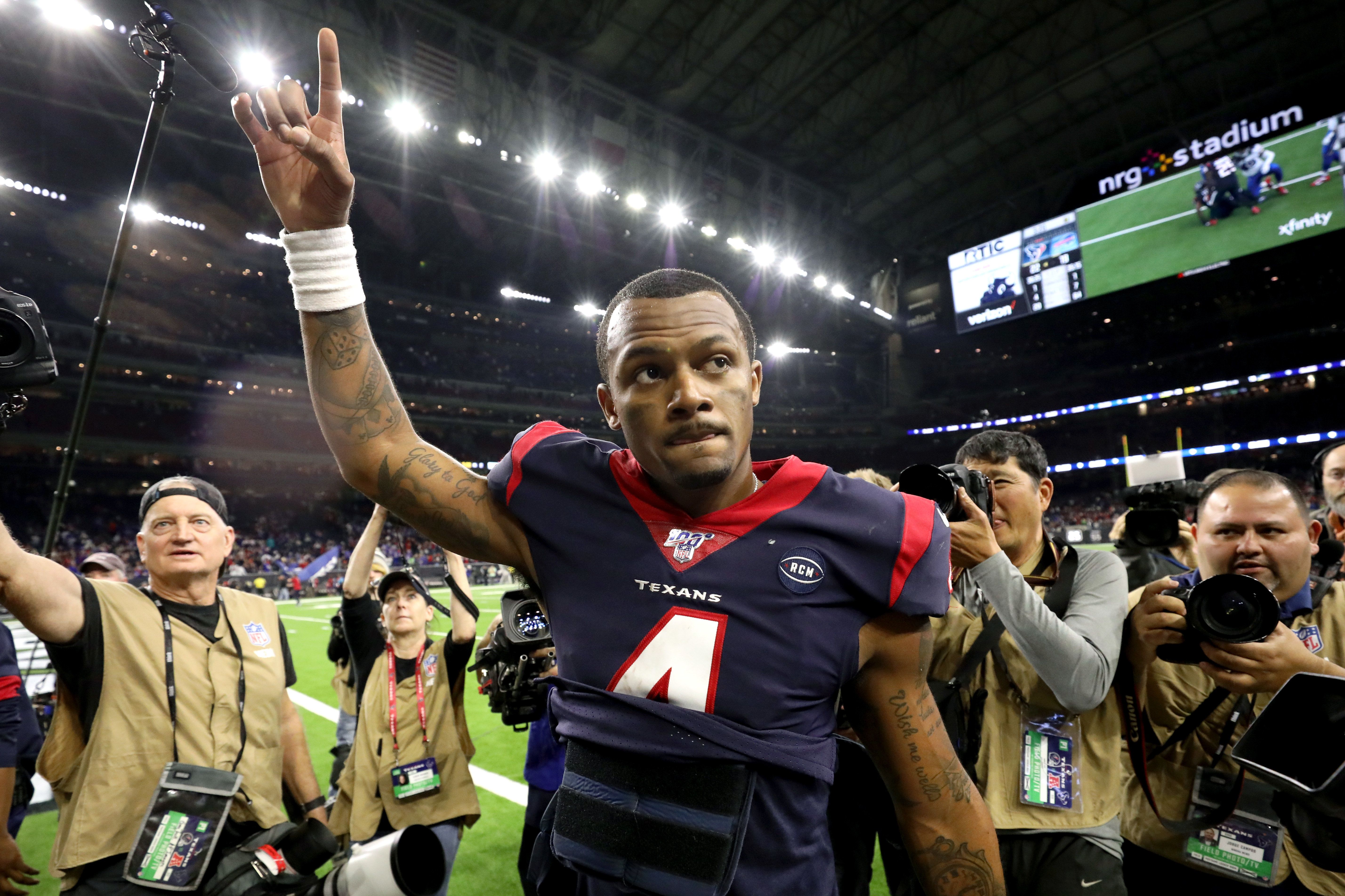 Texans pull off late rally against Bills, escape with rare playoff win in OT