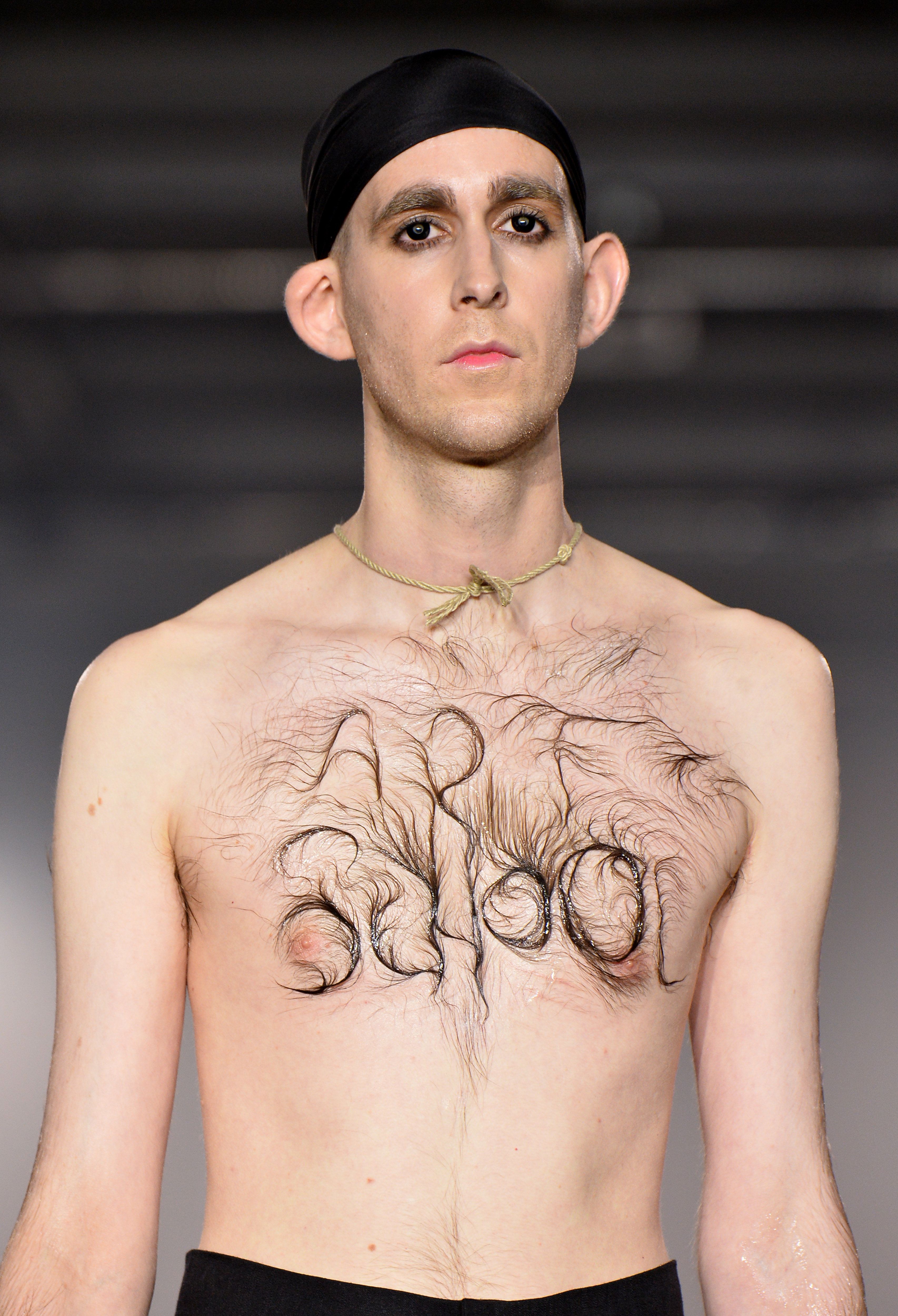 A Model s Chest Hair Spelled Out