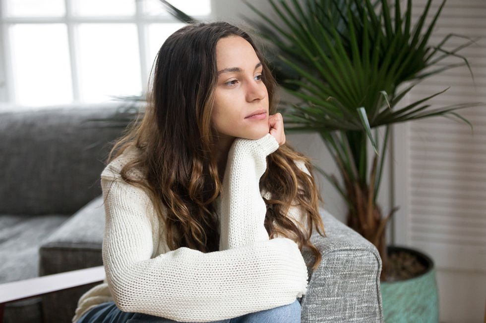 Young woman wondering if her job is secure