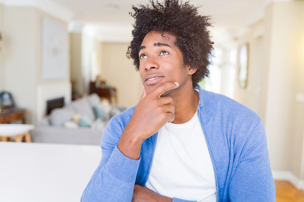 Young man hoping to build wealth in his career