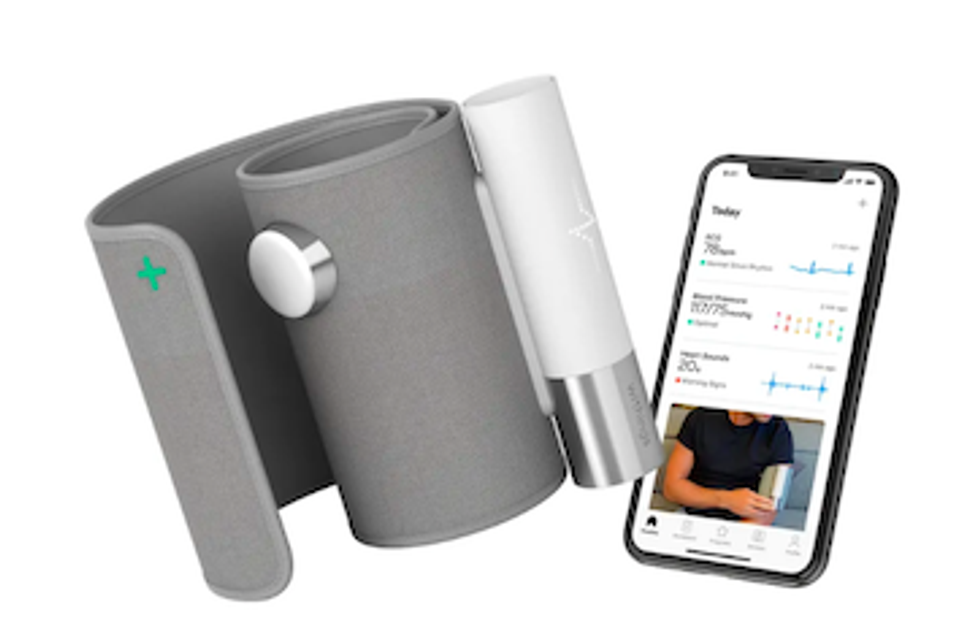 The Withings BPM core with a smartphone opened to its app