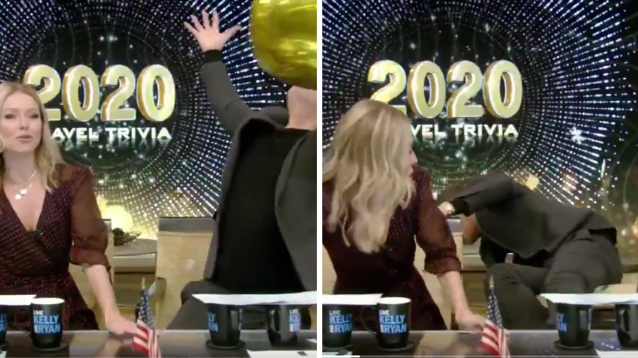 Ryan Seacrest Just Fell Out Of His Chair On Live TV While Trying To Catch A Balloon, And It Was Glorious