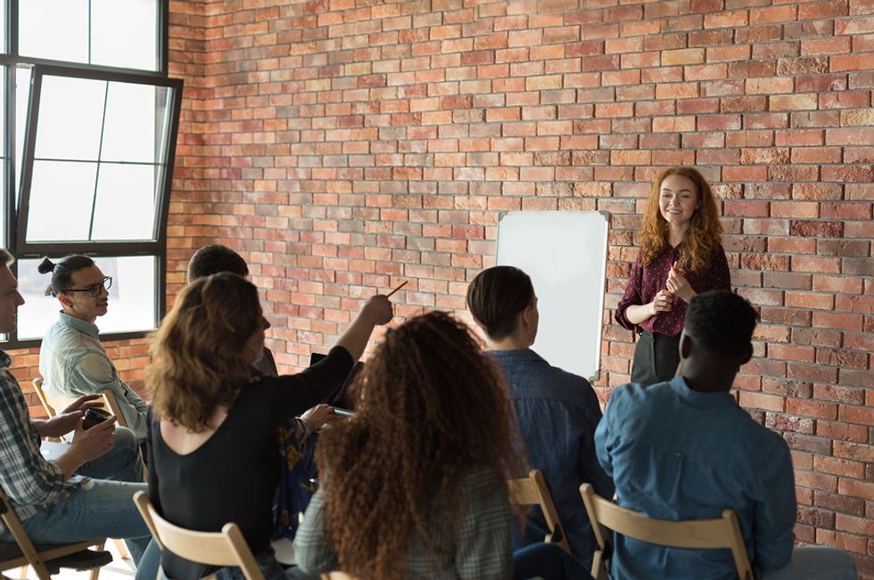 Young workforce discuss strategy for the business' TikTok account