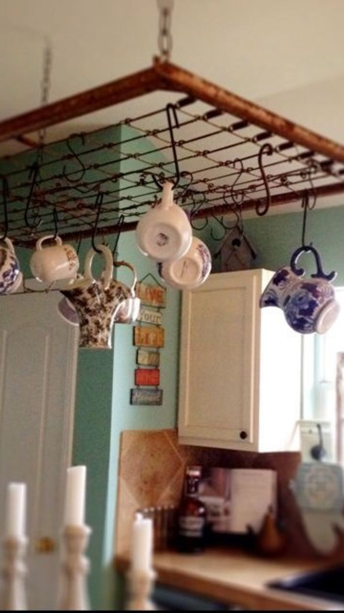 crib frame turned into a hanging kitchen rack