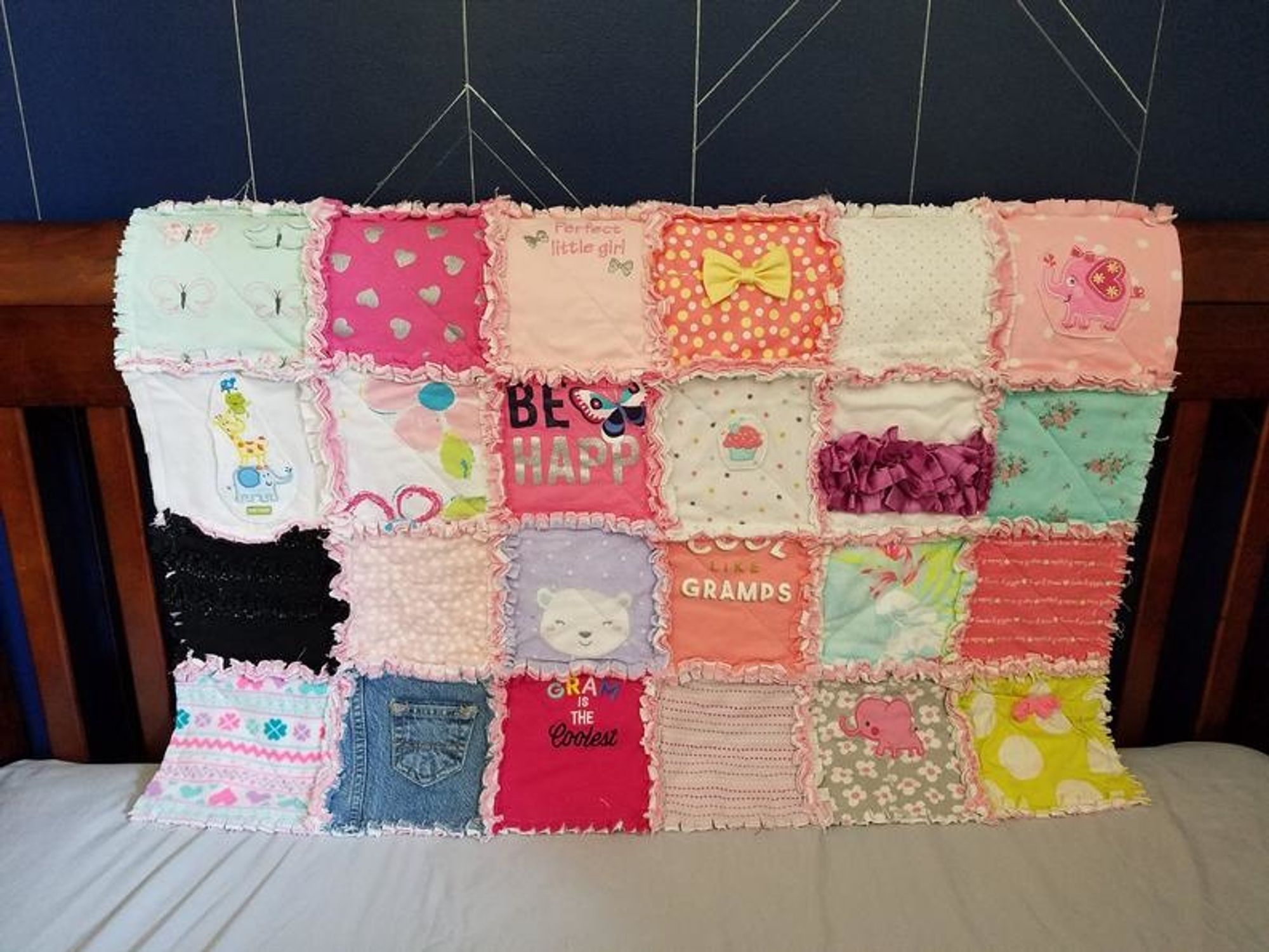 quilt made from baby clothes