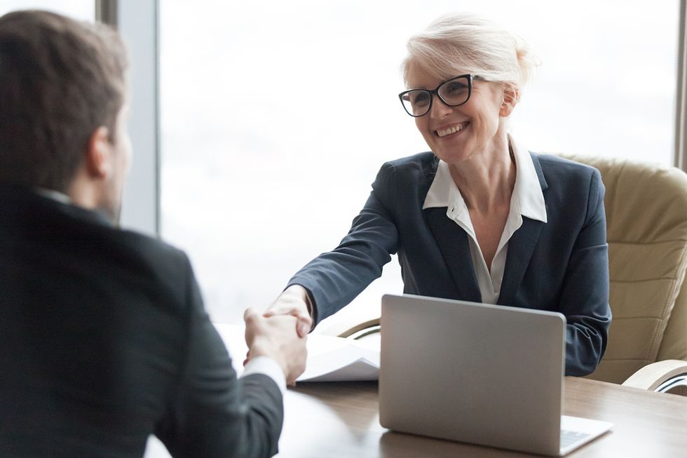 Manager thinking of hiring job candidate for her high-performance team