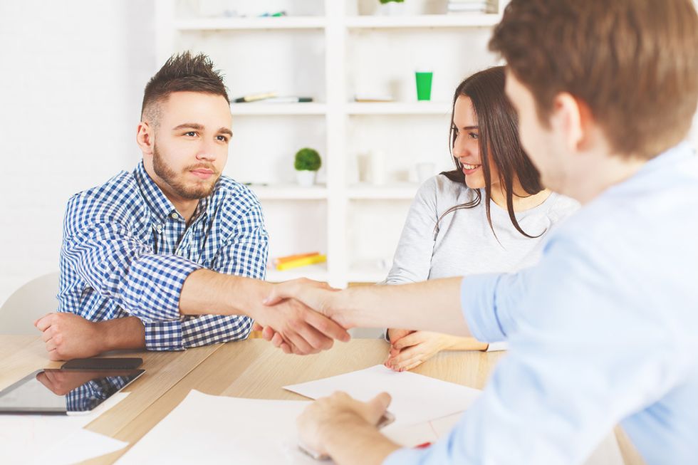Professional man aces his interview for a marketing job