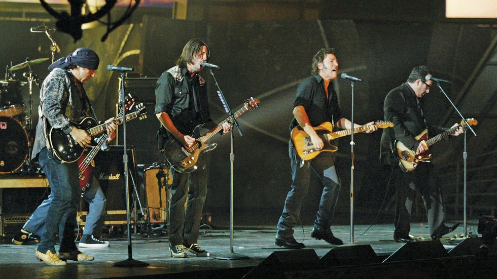 Bruce Springsteen, Elvis Costello, Dave Grohl, and Steven Van Zandt at the GRAMMY Awards in 2003.