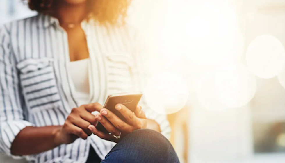 Woman holding a smartphone