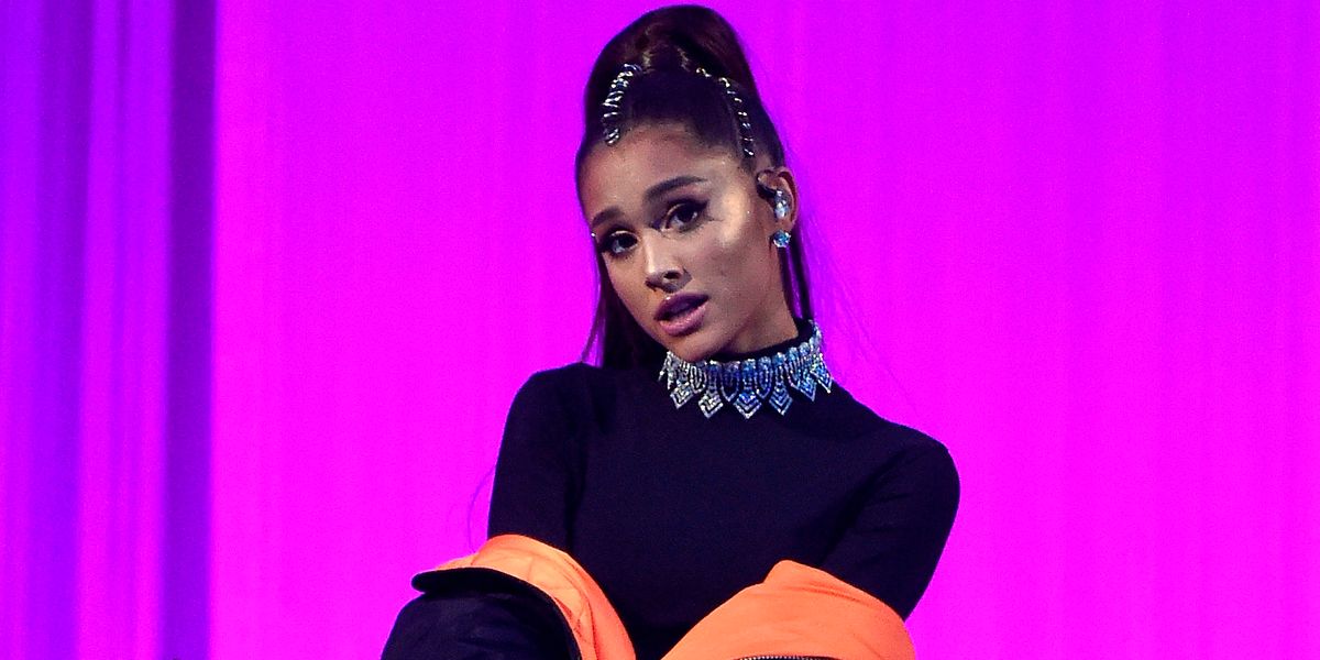 Ariana Grande Stomps Out in Bold Yellow Thigh-Highs & a Hoodie – Footwear  News